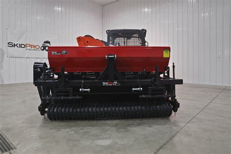 broadcast seeder for skid steer|seeder attachment for skid loader.